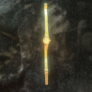 Gold vintage watch with diamond